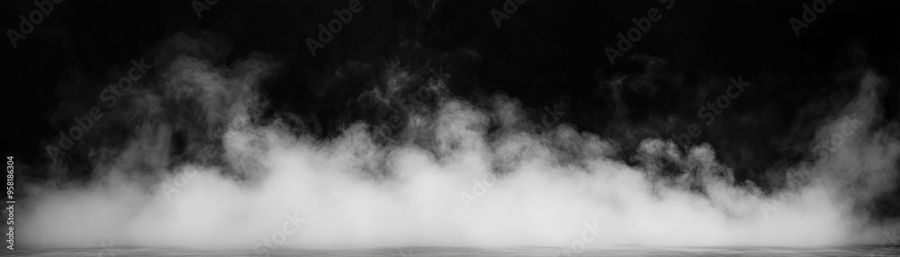 A captivating black and white image of swirling fog, creating a mysterious and atmospheric backdrop for various creative projects. A captivating black and white image of swirling fog, creating a mysterious and atmospheric backdrop for various creative projects.