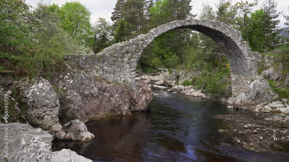 Historic Carrbridge, a stone arch bridge in the Scottish Highlands Historic Carrbridge, a stone arch bridge in the Scottish Highlands