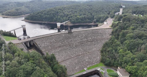 The Gileppe Dam, Dam wall, Power plant powerd by water energy. Hydroelectric. Aerial drone video. photo