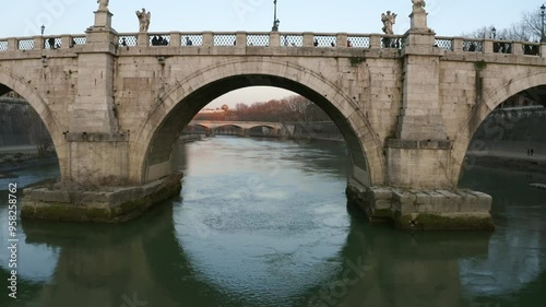 flying under st angelo bridge photo