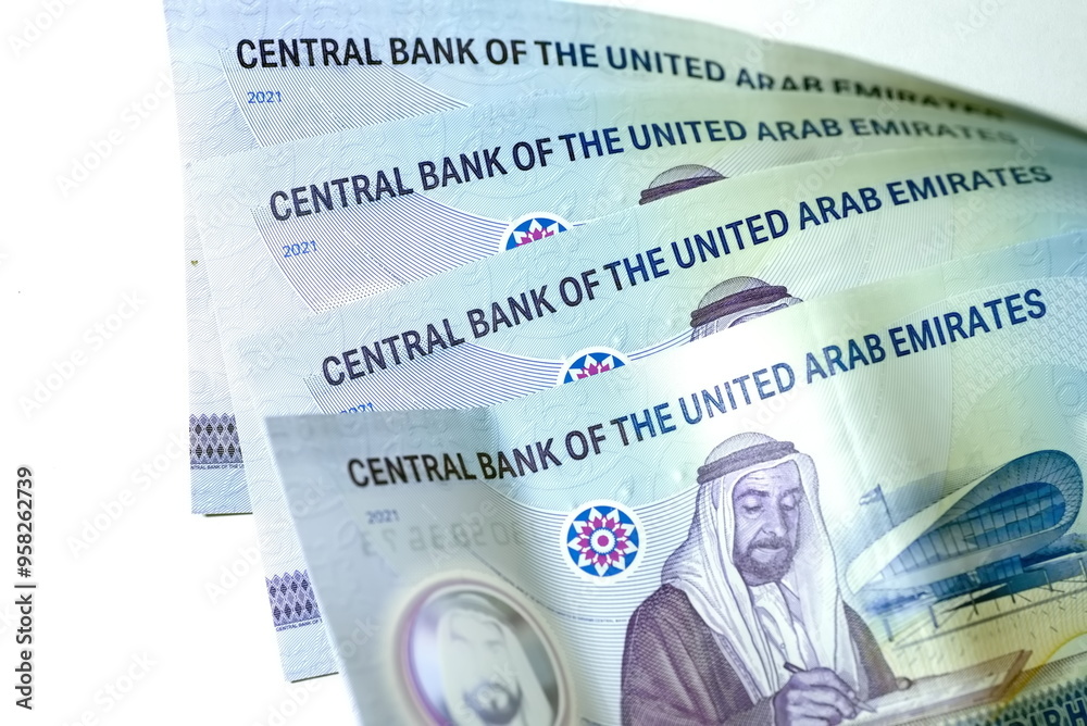 Fototapeta premium Close up Dirhams currency with new design Notes, AED, Bank notes and coins, United Arab Emirates
