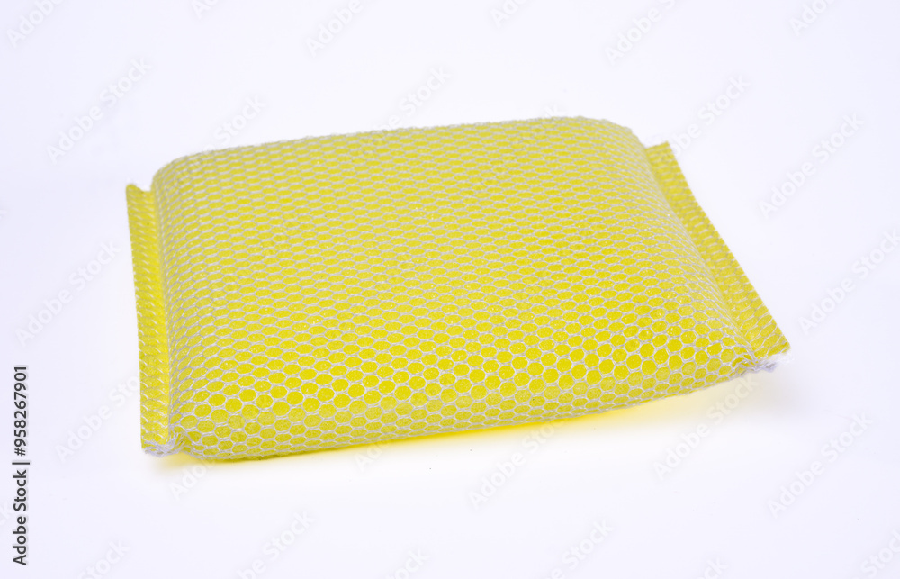 Yellow dishwashing sponge isletad, white background