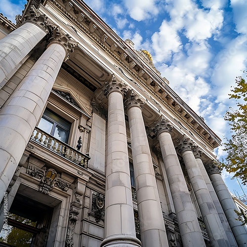Exterior of historic building with columns and arched passage, historical architectural building