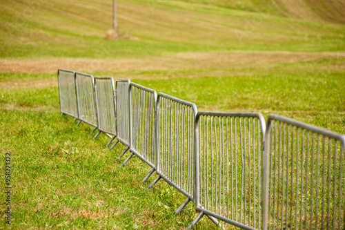  fence in a field of grass in the park