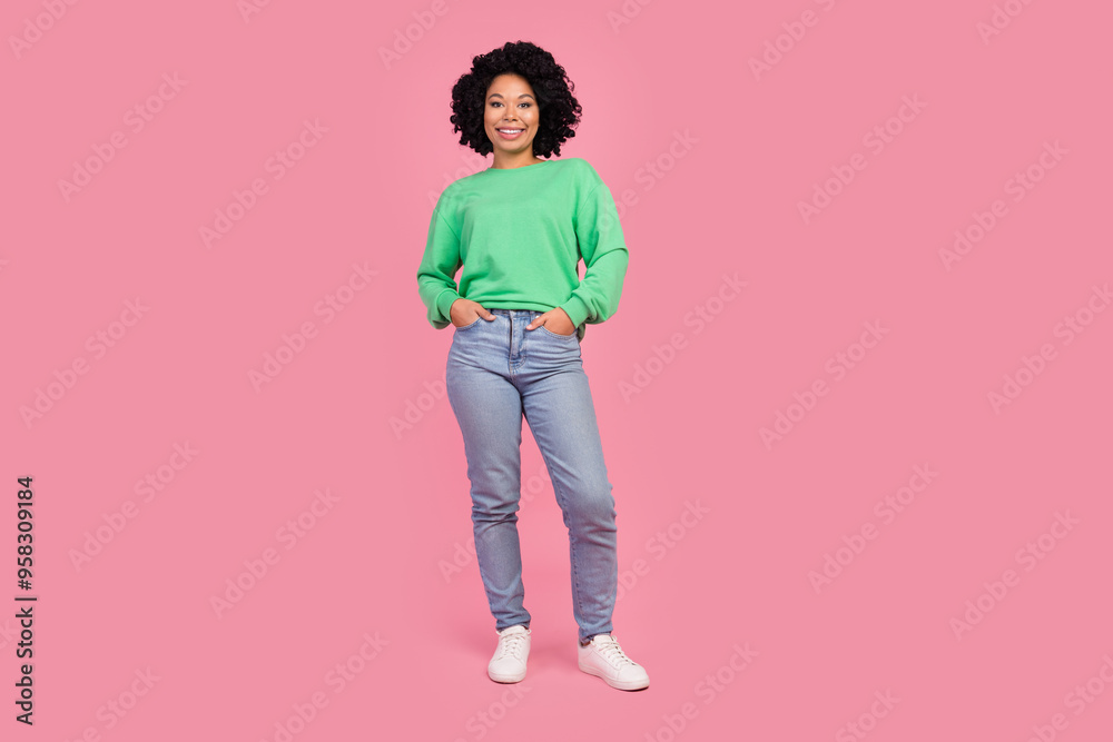 Full length photo of charming positive woman wear green sweatshirt smiling empty space isolated pink color background Full length photo of charming positive woman wear green sweatshirt smiling empty space isolated pink color background
