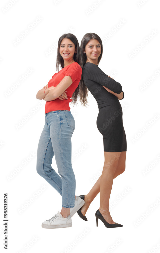 Twins posing back to back with different outfits Twins posing back to back with different outfits