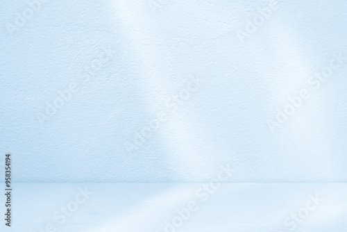 Blue Background Studio with Gradient White Light on Podium stage for Product Display Present,Empty Backdrop wall texture with abstract sun light on floor concrete in pastel blue tone color for Winter photo