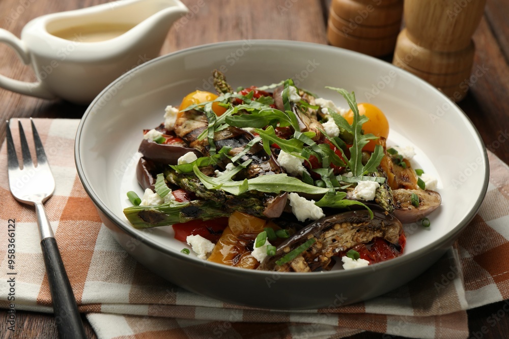 Tasty salad with grilled vegetables served on table, closeup Tasty salad with grilled vegetables served on table, closeup
