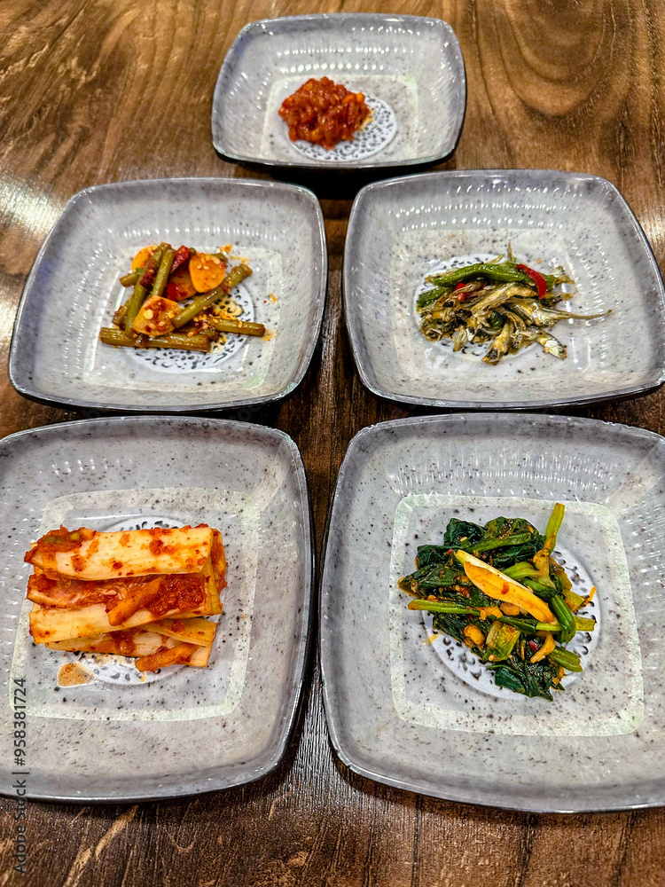 Korean foods served on a dining table. Perfect for photo illustration, article, or any cooking contents.