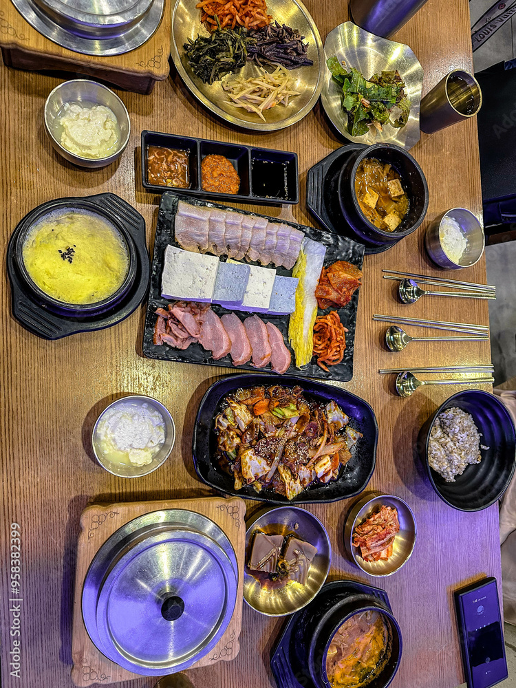 Korean foods served on a dining table. Perfect for photo illustration, article, or any cooking contents.