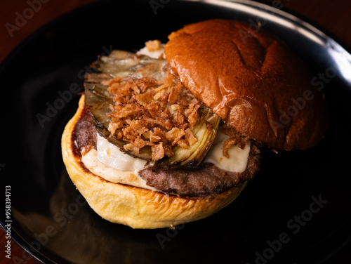 Cheese burger with bacon and egg on black background	
 photo