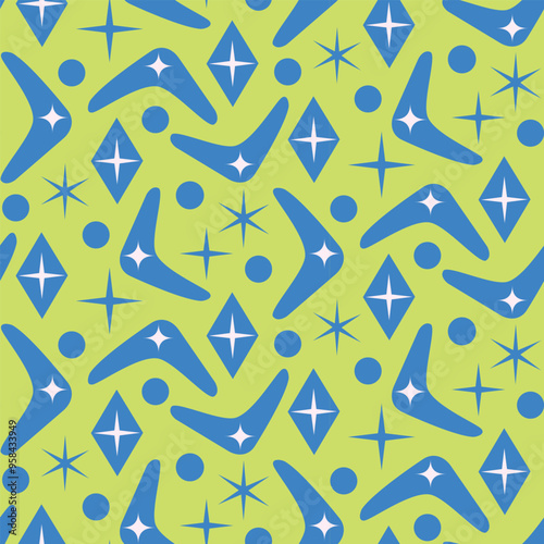 Mid century modern blue boomerang seamless pattern with diamonds and starbursts on yellow background. For wallpaper, home décor and textile