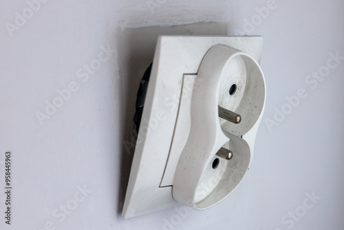 White Power Outlet on Wall Defect photo