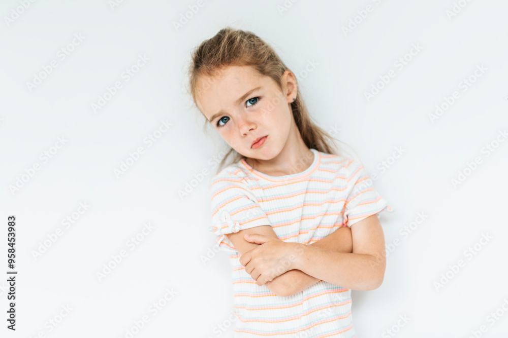 Cute girl 4-5 year old posing in studio Cute girl 4-5 year old posing in studio