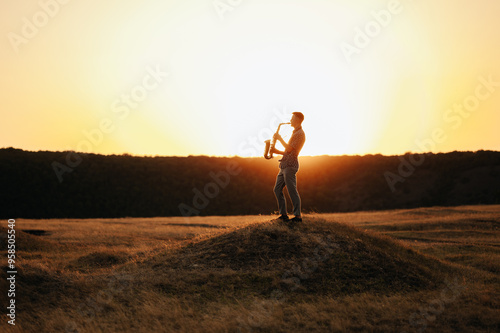 A talented musician is beautifully silhouetted against a breathtaking sunset, radiating creativity and passion