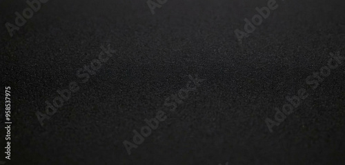 Close-up of a textured surface with black theme. background for banners, posters, wallpaper or template.