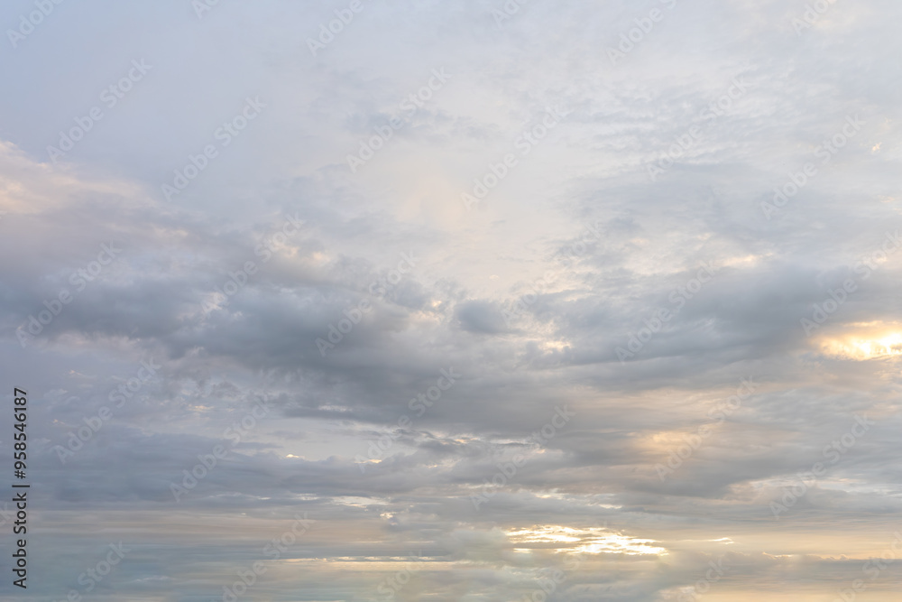 Dramatic cloudscape painted by a sunset, casting long shadows across the landscape Dramatic cloudscape painted by a sunset, casting long shadows across the landscape