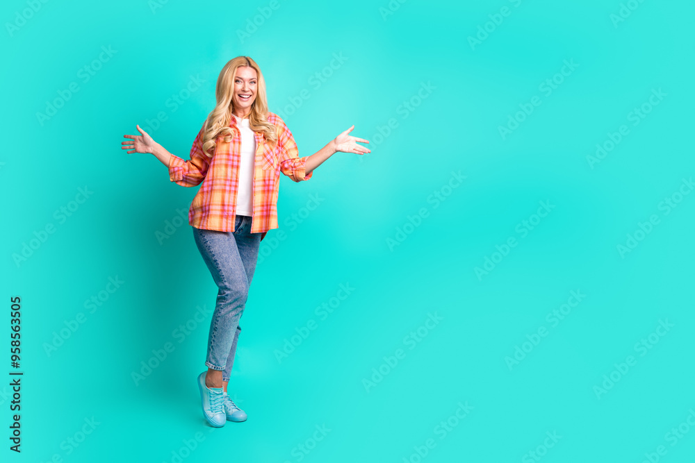 Full length photo of lovely mature lady excited hands want hugging dressed stylish plaid garment isolated on cyan color background