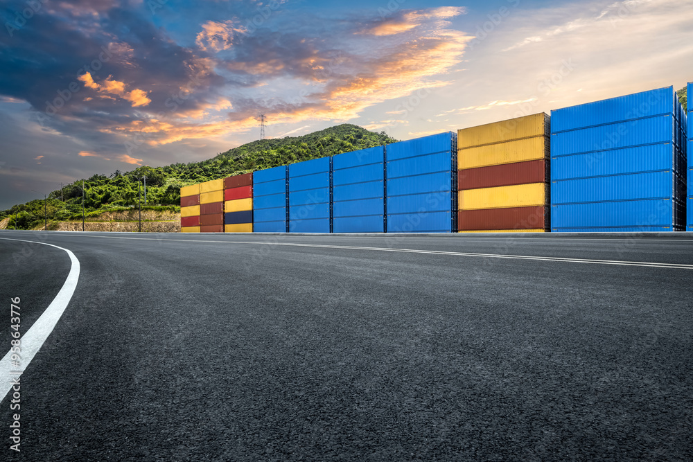 Obraz premium Empty road and stacked containers at port