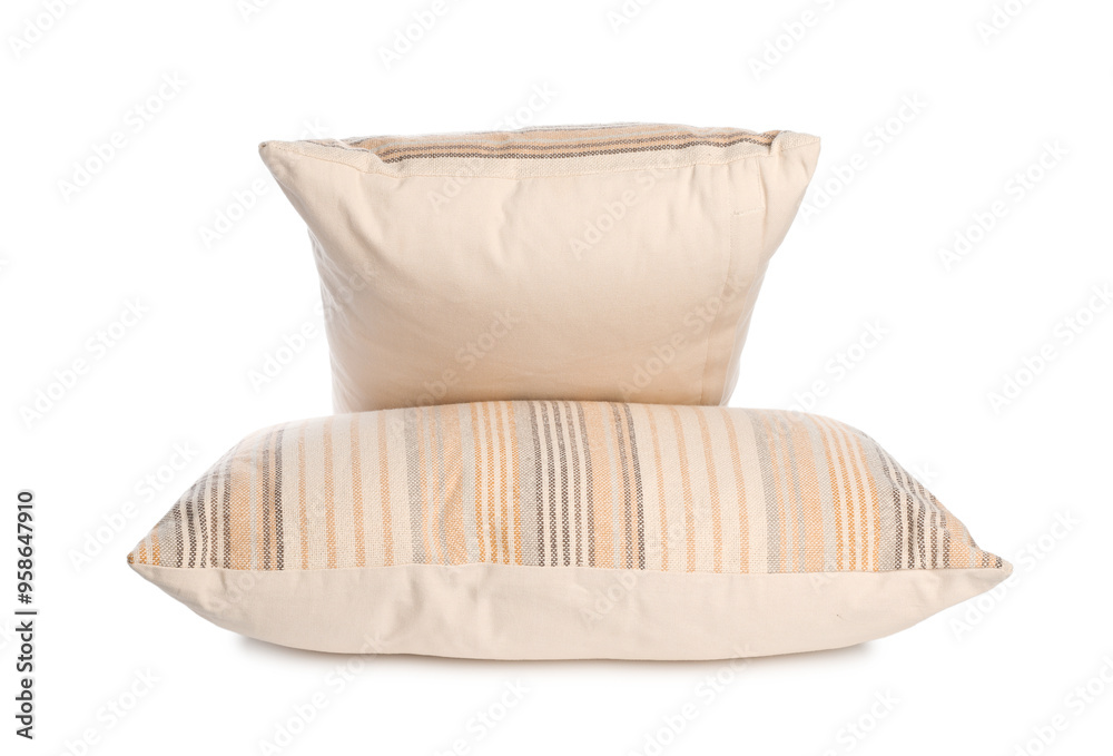 Obraz premium Two light striped pillows isolated on white