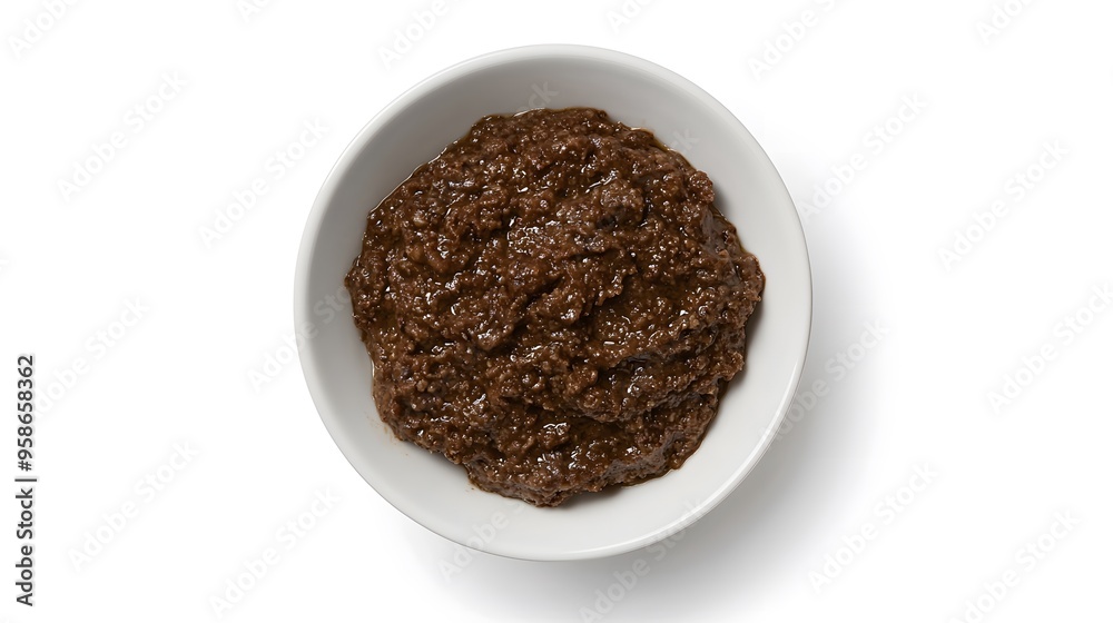 Chocolate chia pudding in white bowl on white background Chocolate chia pudding in white bowl on white background