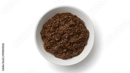 Chocolate chia pudding in white bowl on white background