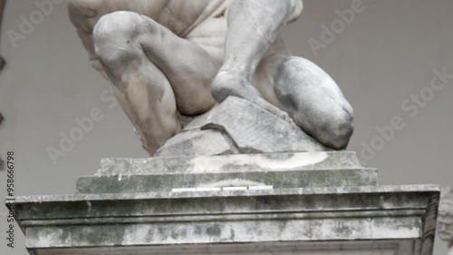 Rape of the Sabine Women is a statue, by Giambologna 1574, in the Loggia dei Lanzi in Piazza della Signoria in Florence, Tuscany, Italy. European art and heritage.