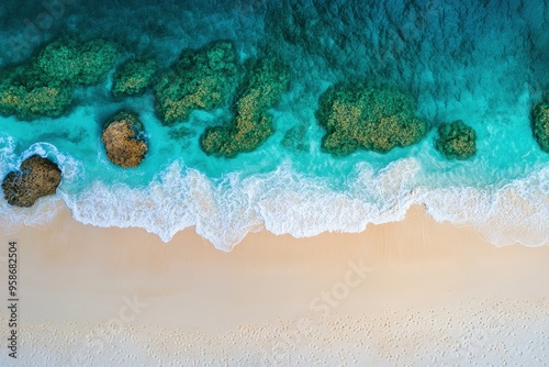 an aerial view of a sandy beach and ocean