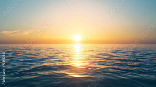 Sunrise over a calm ocean horizon 