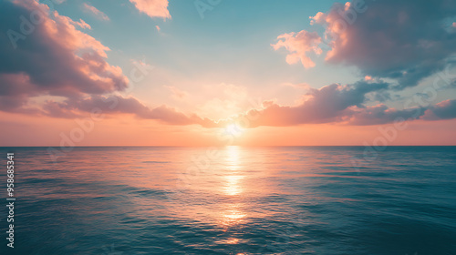 Serene ocean sunset with colorful sky and calm waves 