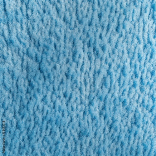 Sky blue close-up of monochrome carpet texture background from above. Texture tight weave carpet blank empty pattern with copy space for product design