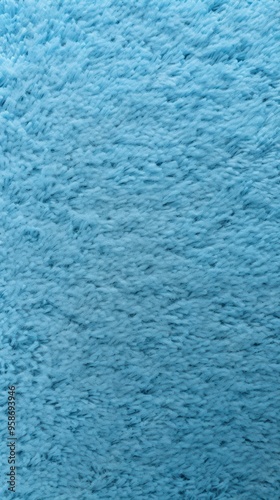 Sky blue close-up of monochrome carpet texture background from above. Texture tight weave carpet blank empty pattern with copy space for product design