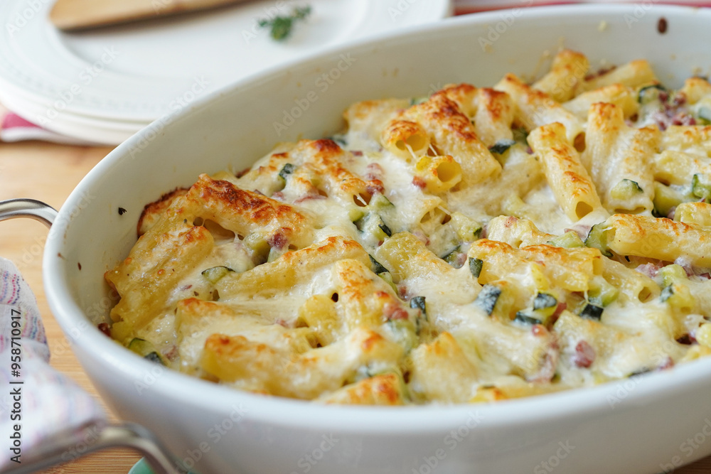 Homemade macaroni gratin made with zucchini and ham Homemade macaroni gratin made with zucchini and ham
