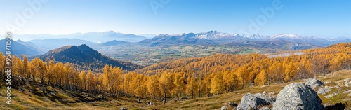 Serene autumn view of the mountains, with a breathtaking array of fall colors and a peaceful natural setting