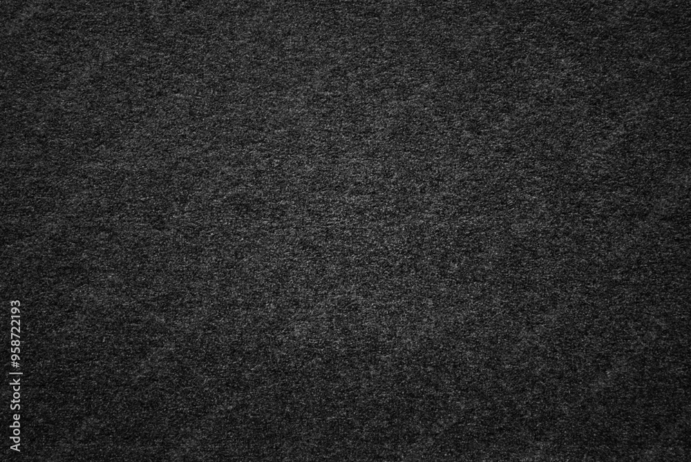 Black rough paper or cardboard texture as background Black rough paper or cardboard texture as background