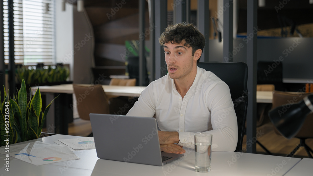 Fototapeta premium Caucasian businessman excited support negotiate idea talking business video call with laptop close computer happy win joyful rejoice man employer entrepreneur feel satisfied in office after conference