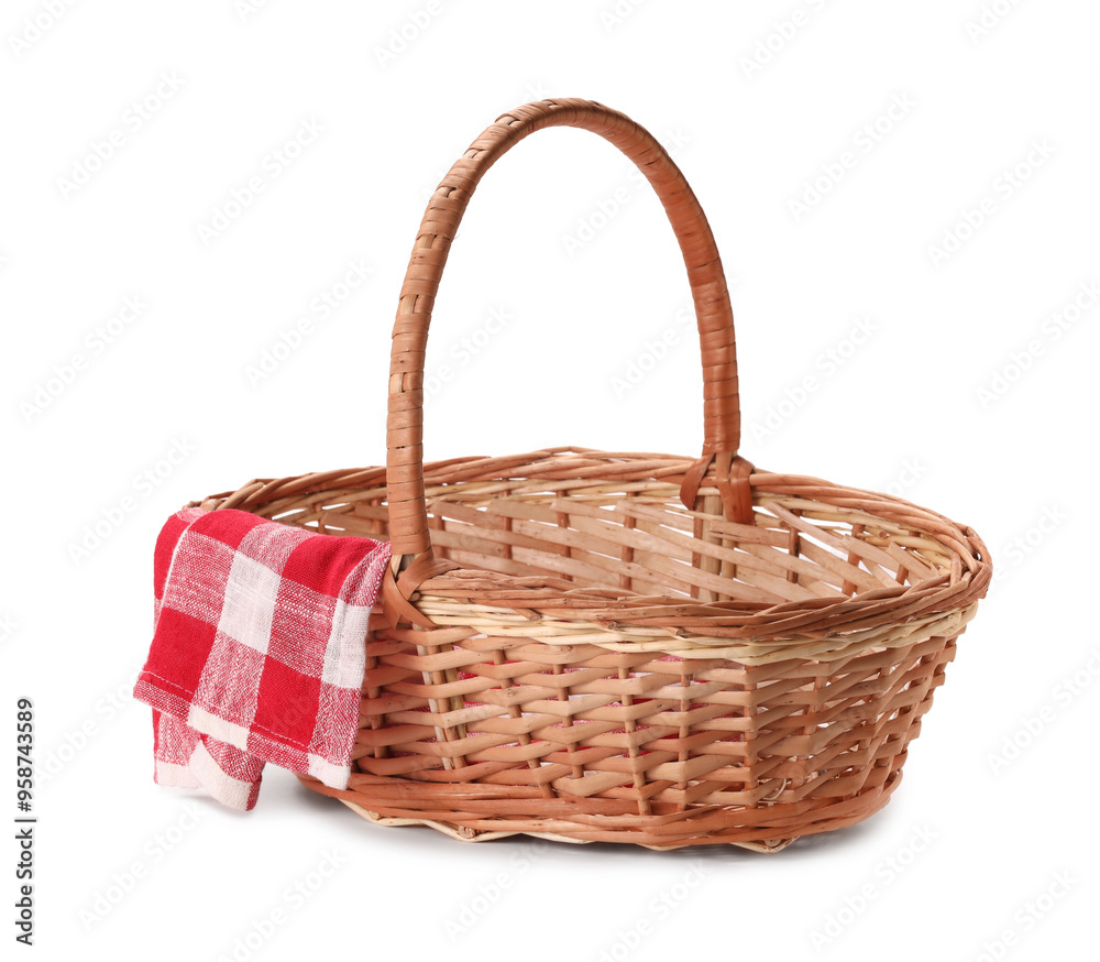 One picnic wicker basket with checkered napkin isolated on white One picnic wicker basket with checkered napkin isolated on white