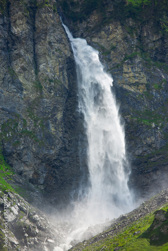 big staubifall waterfall in Switzerland alps. travel and hiking concept