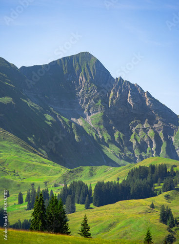 green grass hills and mounains in a national UNESCO park. vacation and travel concept