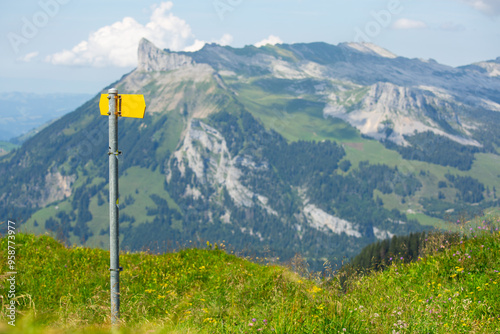 tourist yellow sign in the alpine mountainhiking and travel concept