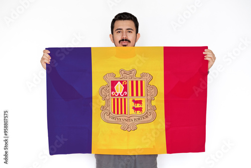 Young man holding Andorra flag, two hands and white background, independence day idea, celebration 