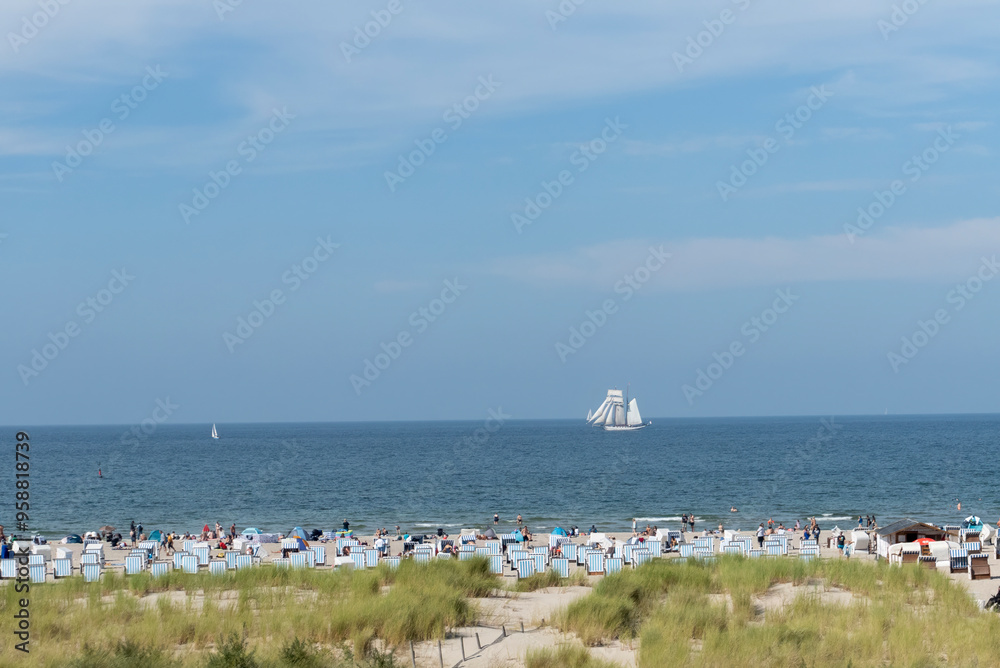 Obraz premium A tall ship off the coast at Warnemunde in Mecklenburg-Vorpommern, Germany
