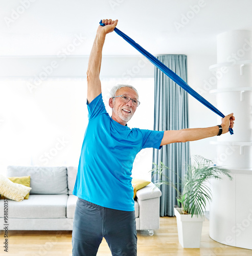Obraz na płótnie senior active exercise training sport fitness home band resistance elastic equip