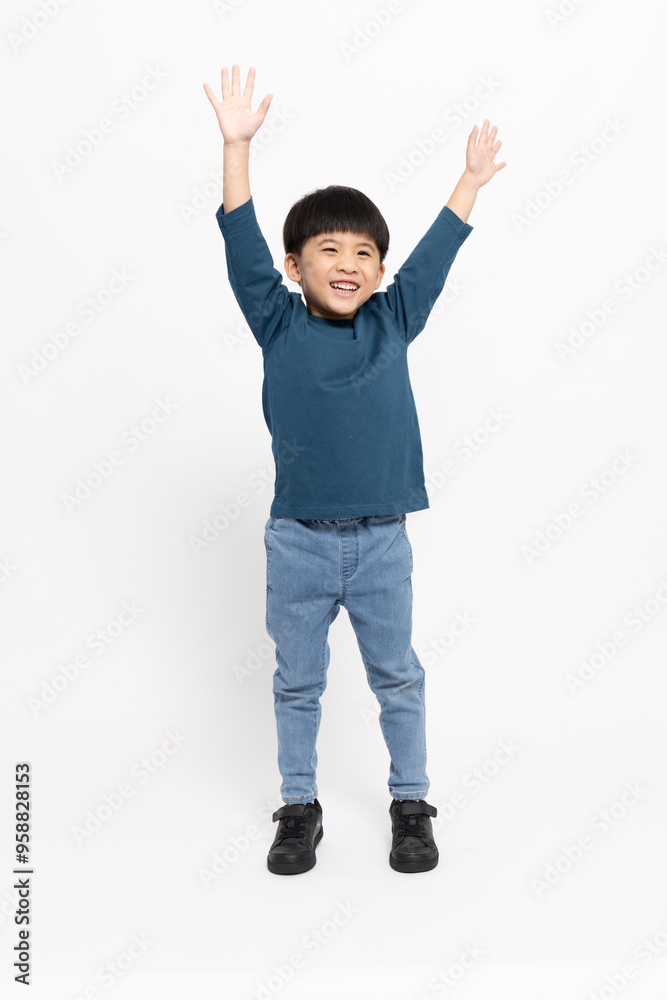 Happy Asian little boy hands up raised arms from happiness isolated on white background, Excited kid winner success concept, Looking at camera and full body composition Happy Asian little boy hands up raised arms from happiness isolated on white background, Excited kid winner success concept, Looking at camera and full body composition