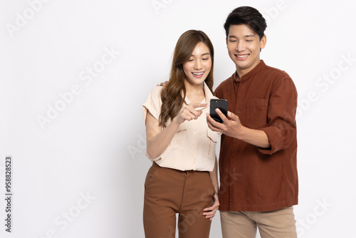 Happy Asian couple businessman and businesswoman using mobile phone isolated on white background