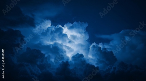 blue dark dark and stormy night sky with sparkle rumble thunder glowing in cloud