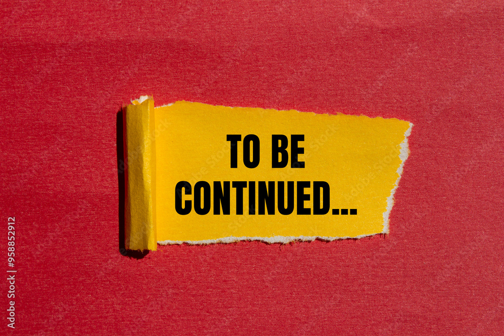 To be continued message written on ripped torn yellow paper with red ...