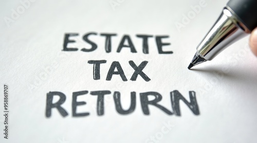 Estate tax return form with pen ready for completion