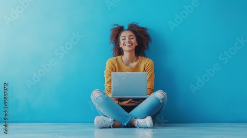 Happy lady with laptop using the internet. photo