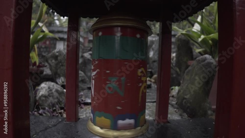 Prayer wheel with the words Om Mani Padme hung, Dharamsala, India.
Buddhism, prayer, spirituality, prayers concept.